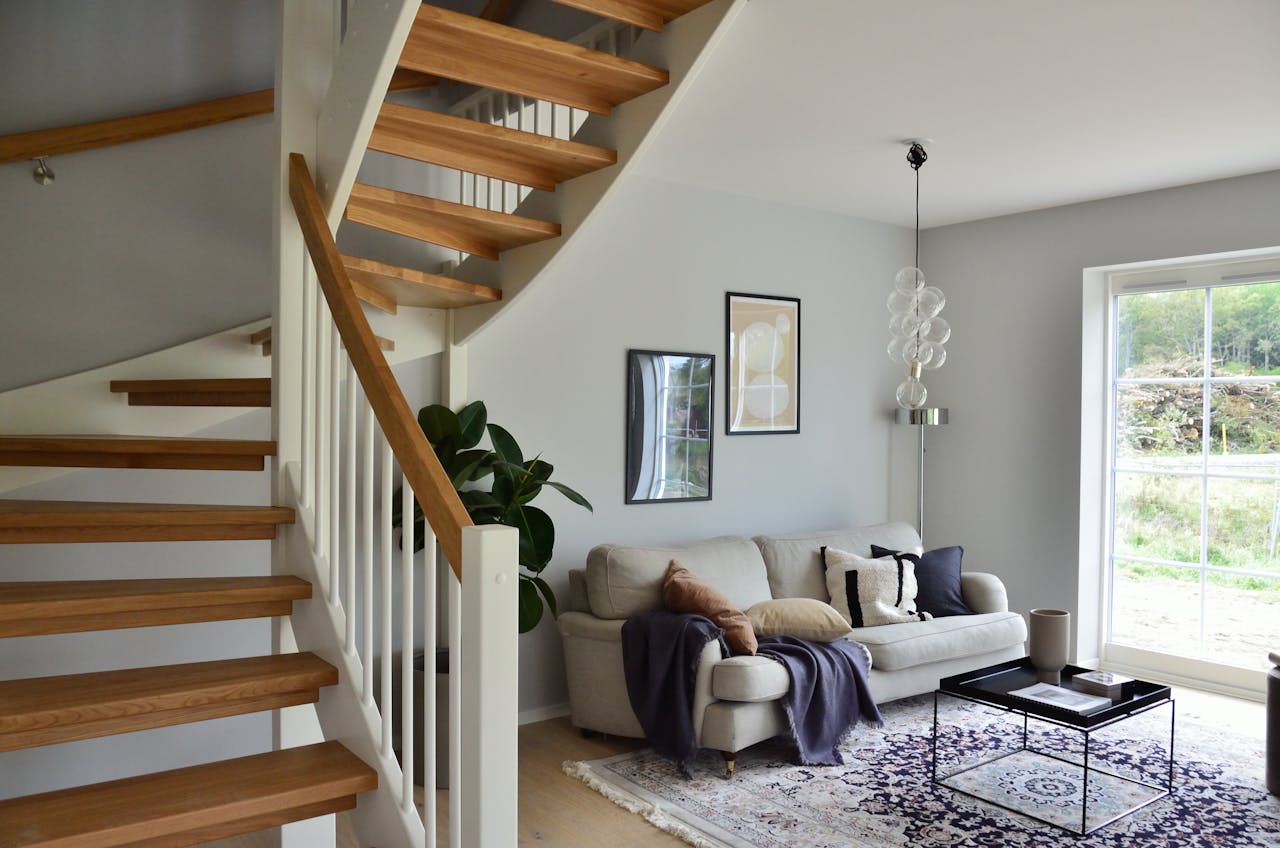 What is the difference between a spindle and a baluster?