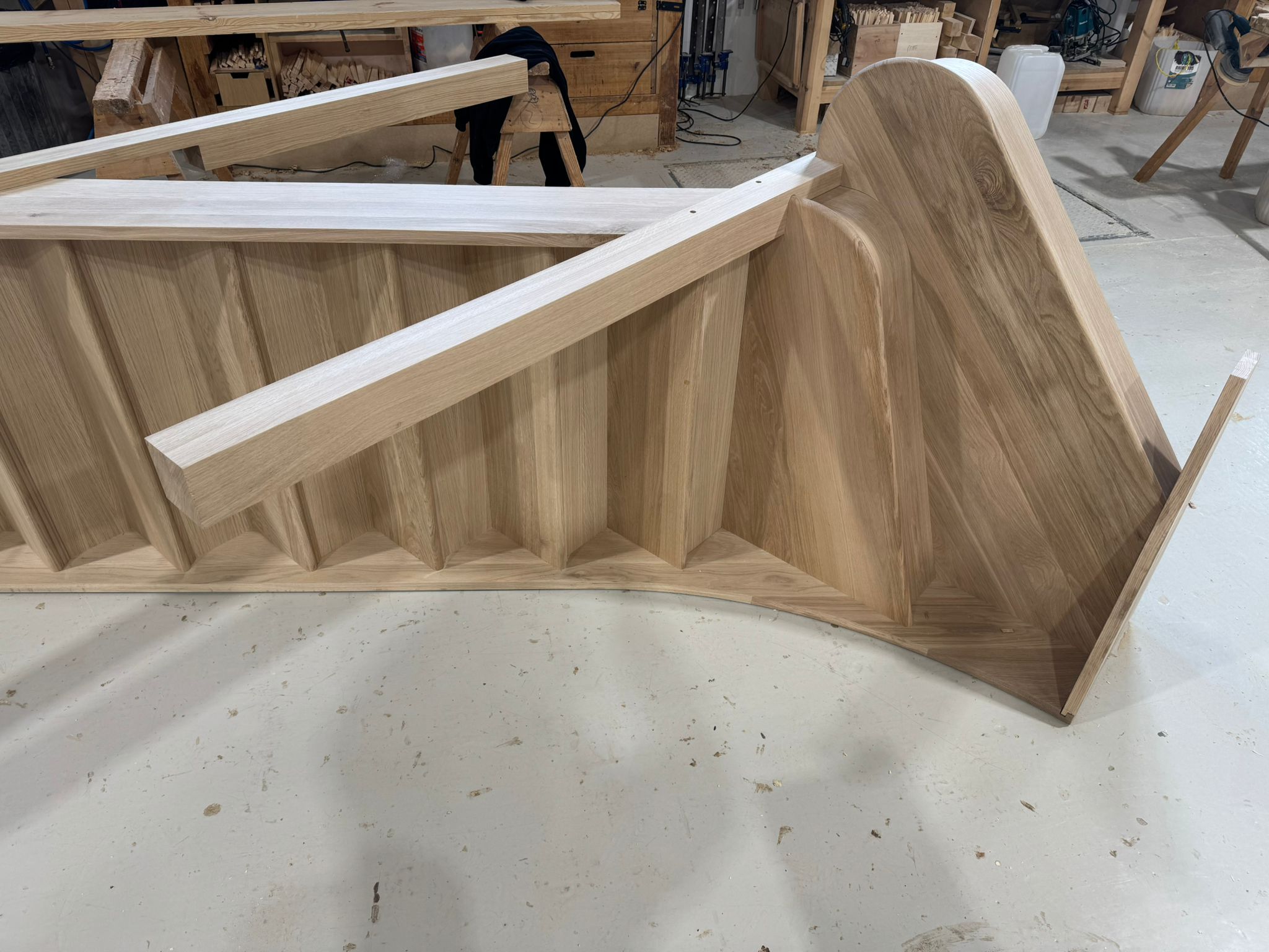 Are wood stairs cheaper than carpet?